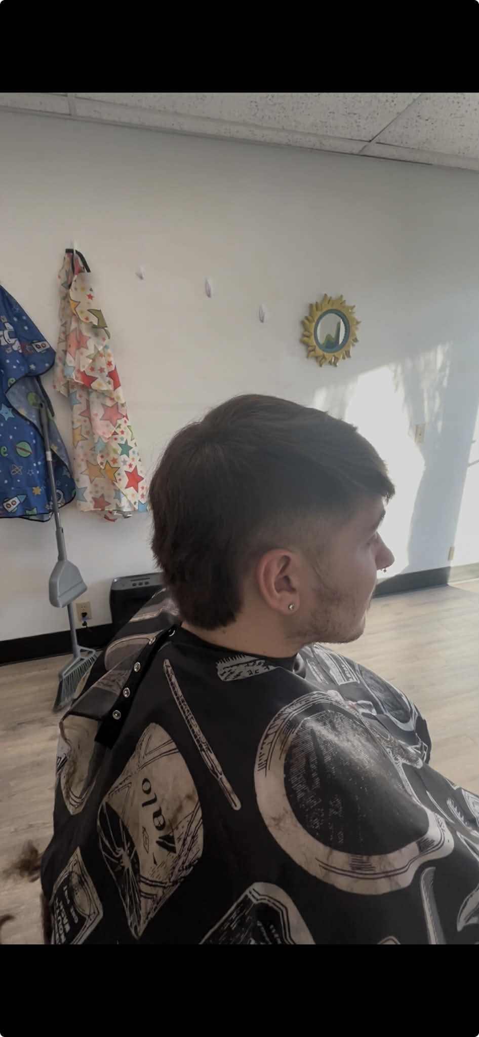 Short mullet haircut.