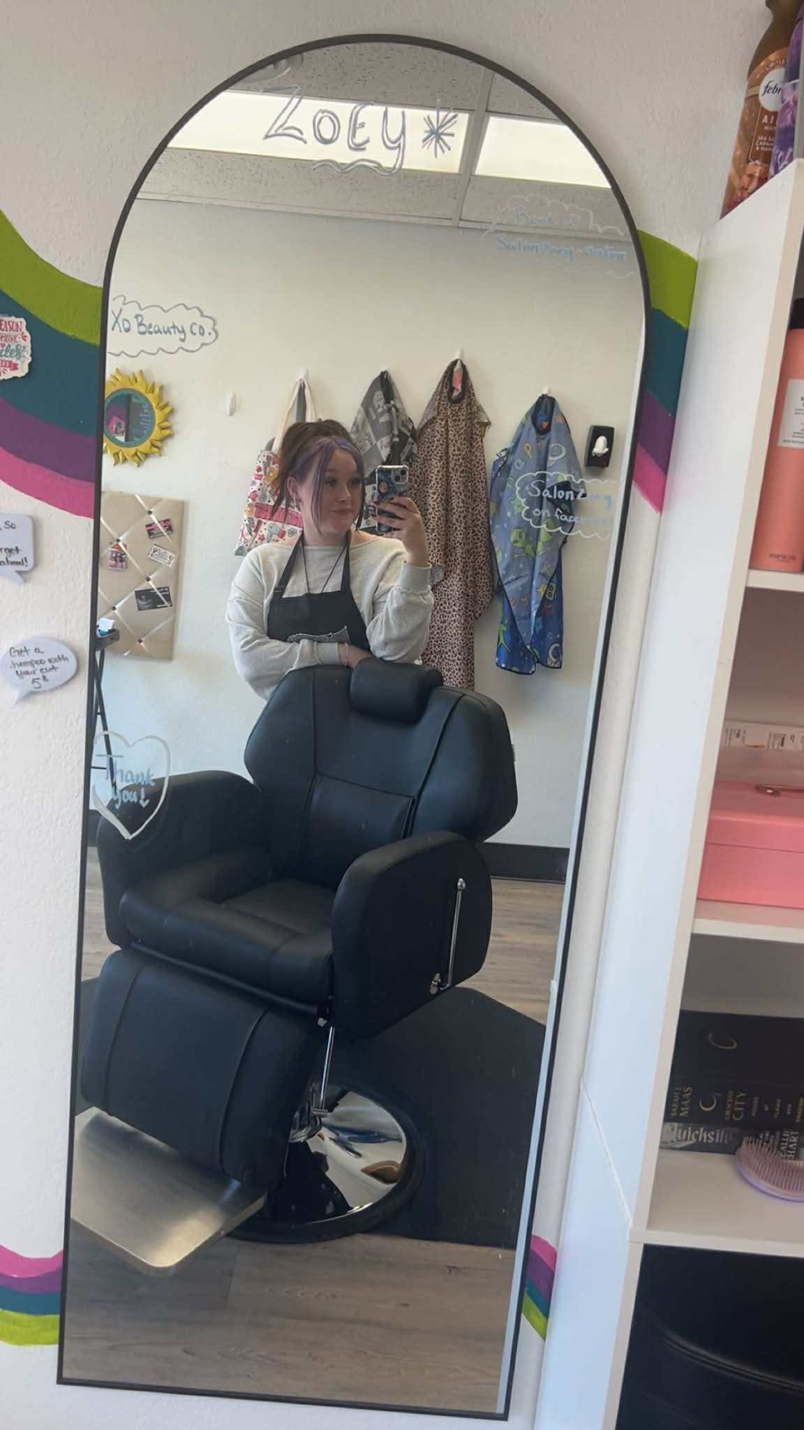 Zoey behind the chair.